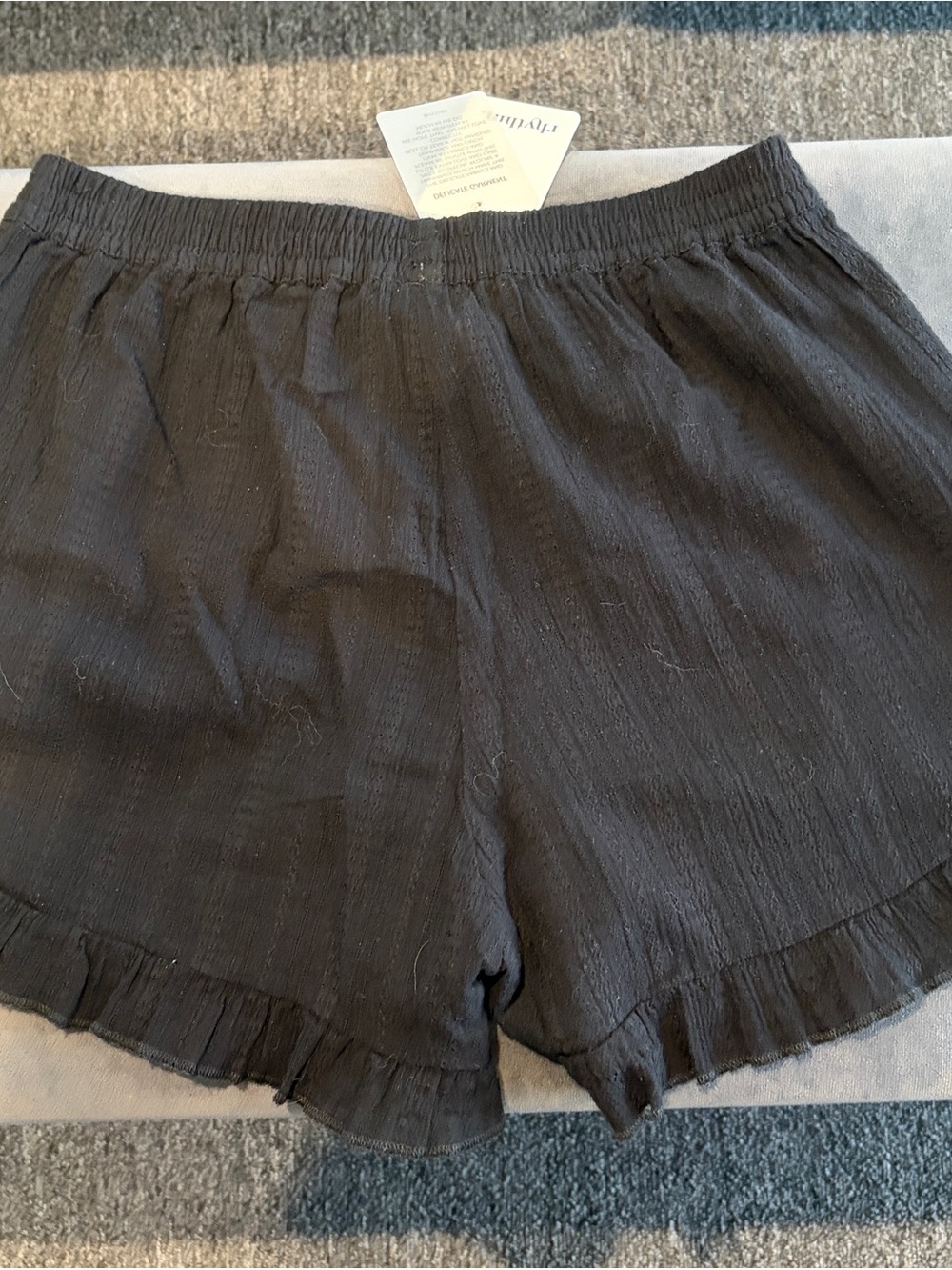 Rhythm. Black High-Waist Ruffle Hem Shorts - Picture 2 of 8